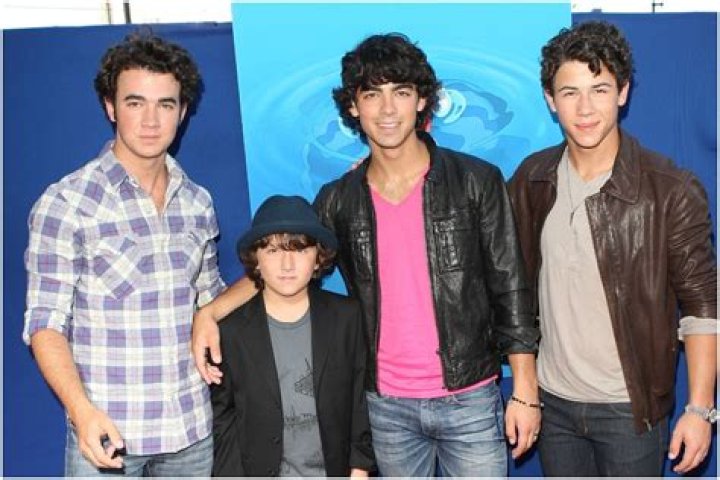 Are the Jonas Brothers adopted?
