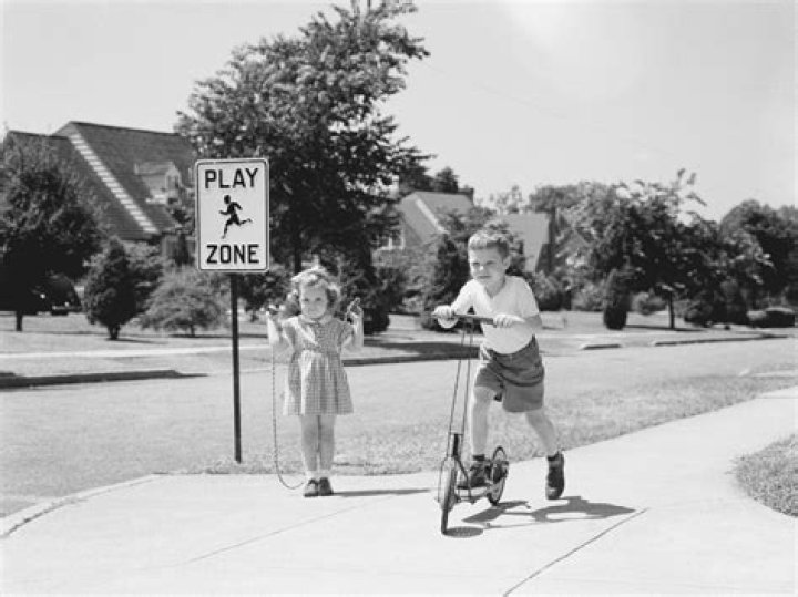 How did life in the suburbs provide a model for the American dream?