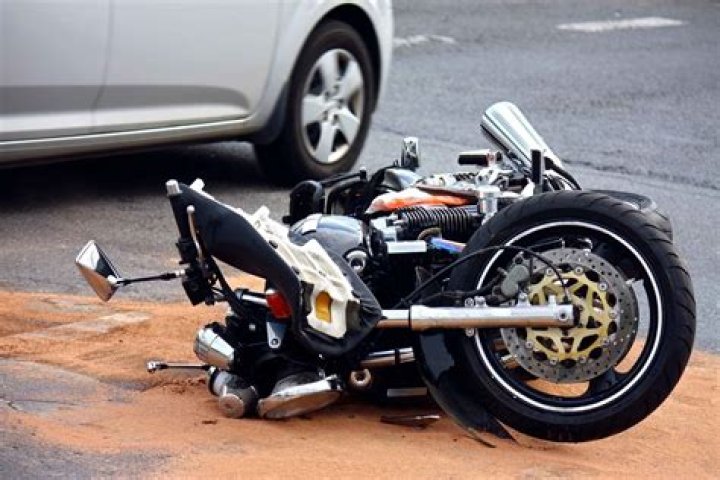 How does insurance determine if a motorcycle is totaled?