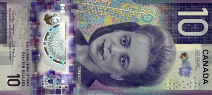 How much does a Canadian 10 dollar bill weigh?
