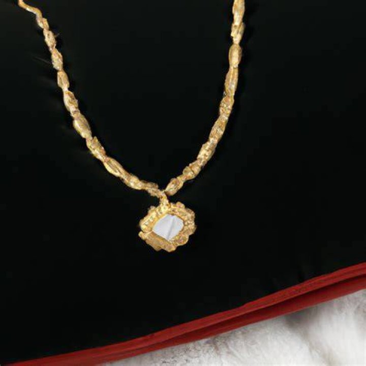 How much is a 18 karat gold necklace worth?