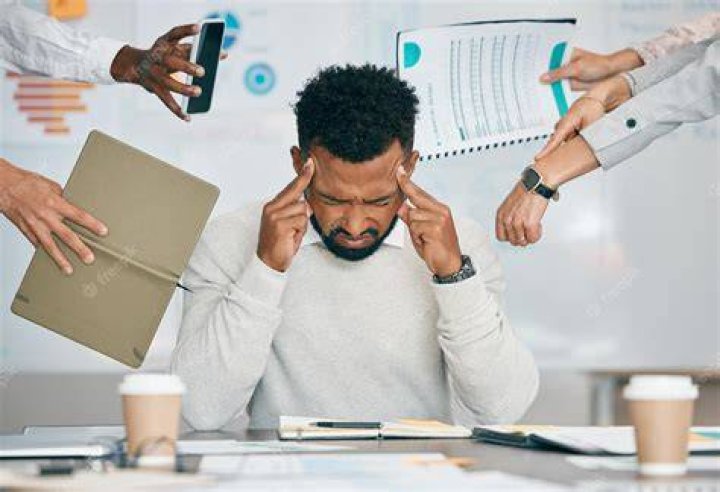 What are the signs of being overworked?