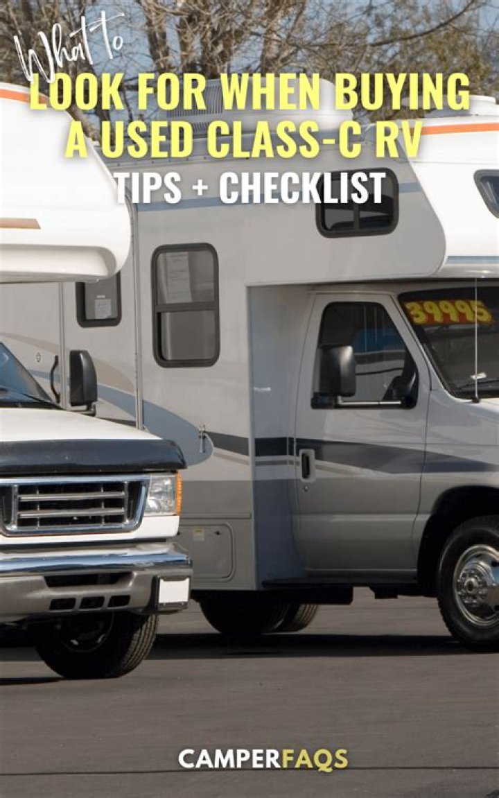 What questions should I ask when buying a used camper?