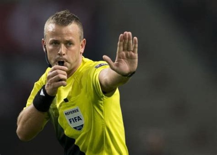 When did football referees first use whistles?
