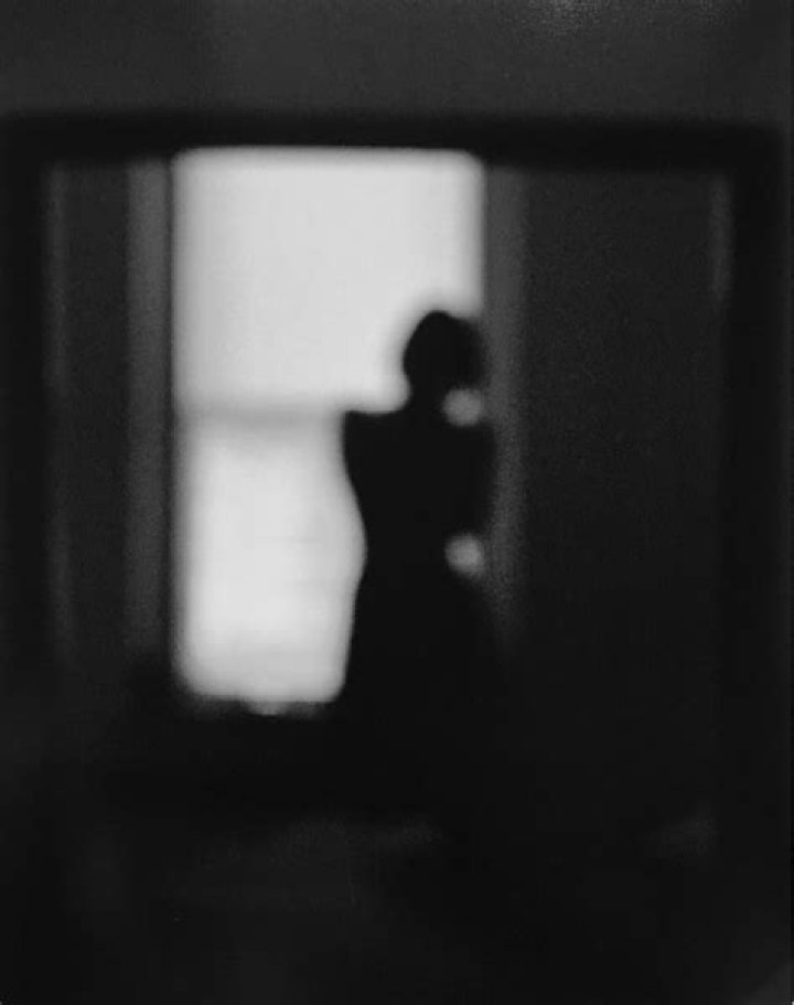 Why do photographers use dark rooms?